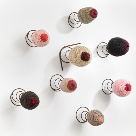 "Women's Spring." 2020. Hand knit breasts mounted on mattress springs.